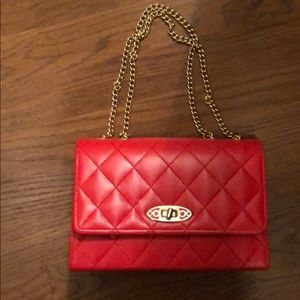 Red quilted flap bag